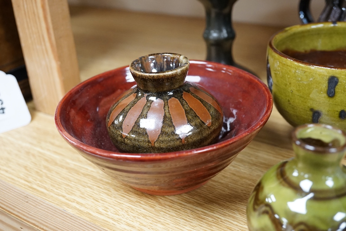 A collection of studio pottery to include a Celtic pottery Newlyn goblet, various jugs and bowls, largest 19cm high